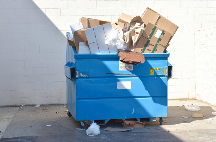 Waste baler reducing collection costs
